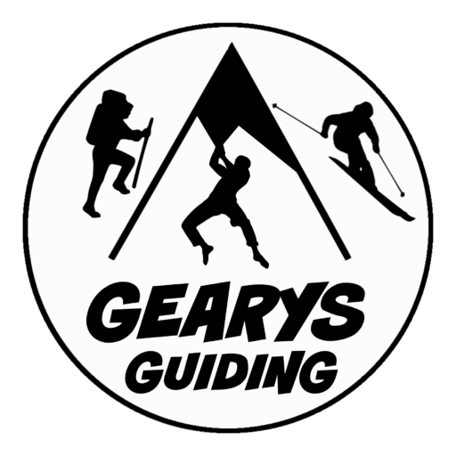 Gearys Guiding logo showing a mountin, skier, rock climber and mountaineer